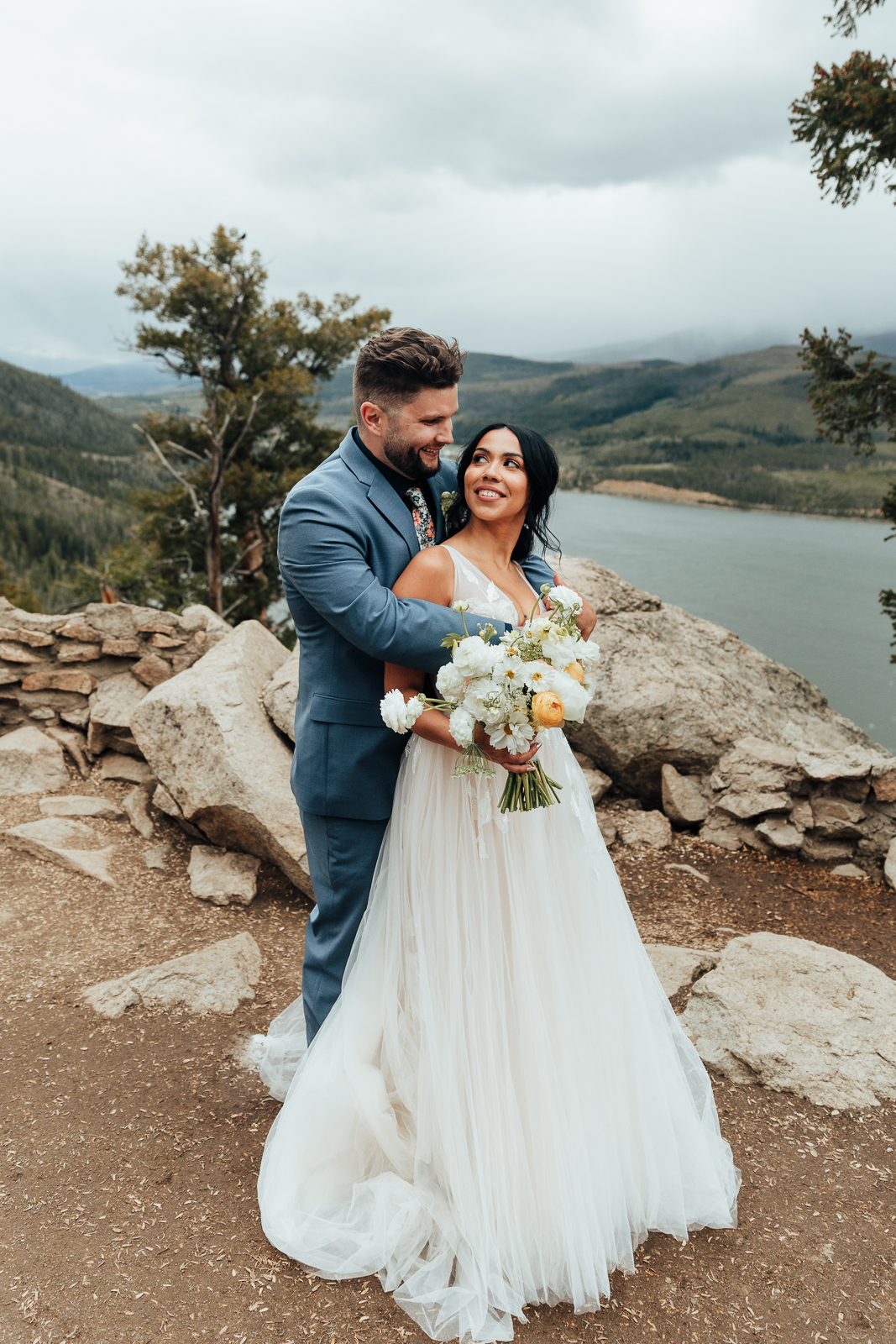 Couple hugging at their Sapphire Point Overlook elopement