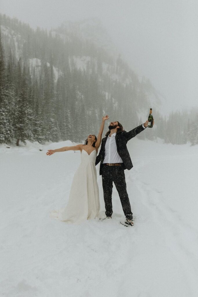 A couple celebrating their elopement at Dream Lake in Rocky Mountain National Park