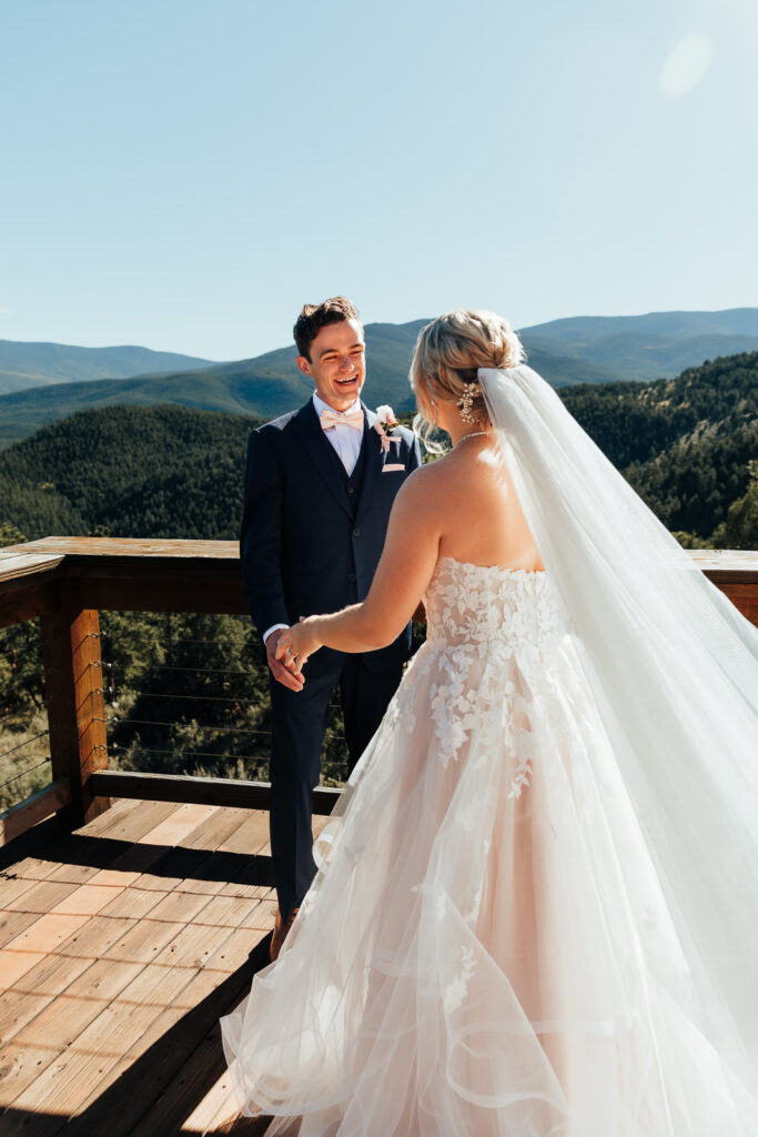 Couple doing a first look at their Airbnb elopement in Bailey, Colorado