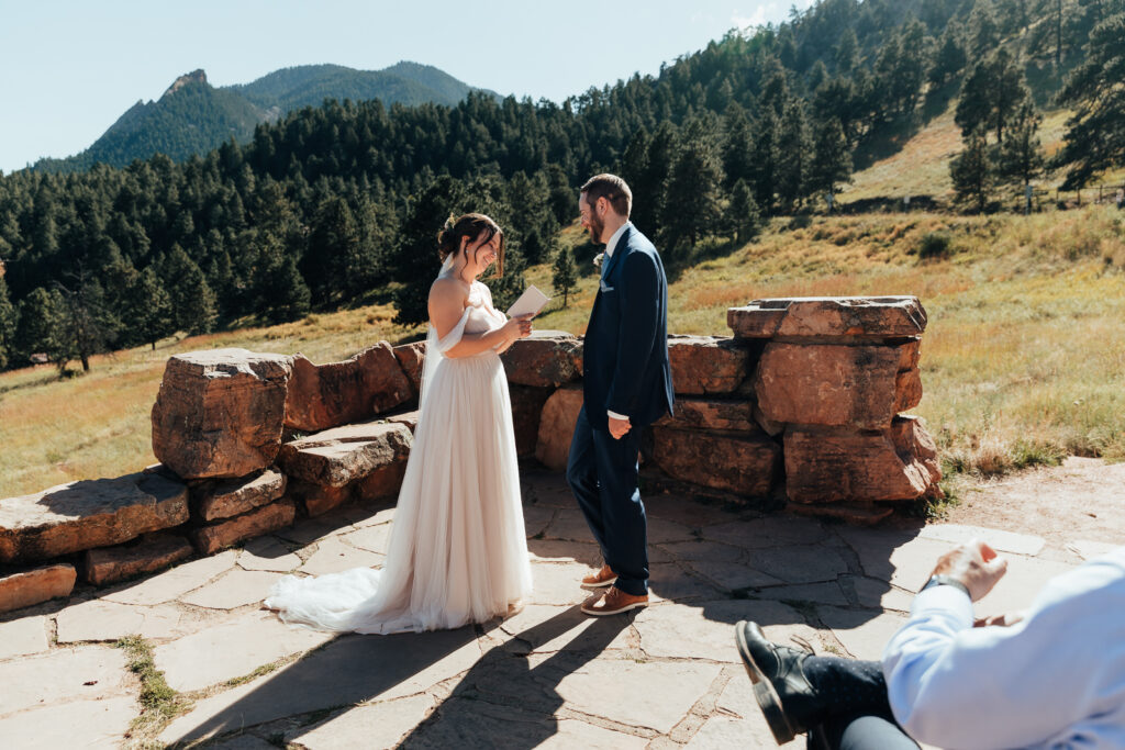 A couple exchanging vows at the Halfway House in Boulder, Colorado
