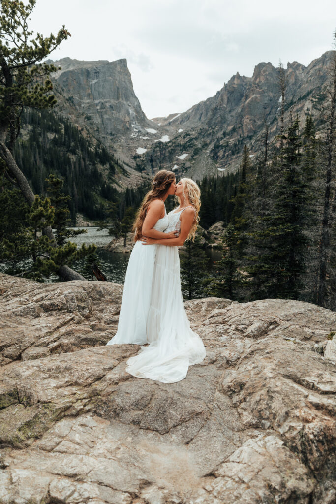 Couple kissing at Dream Lake, Rocky Mountain National Park in Estes Park