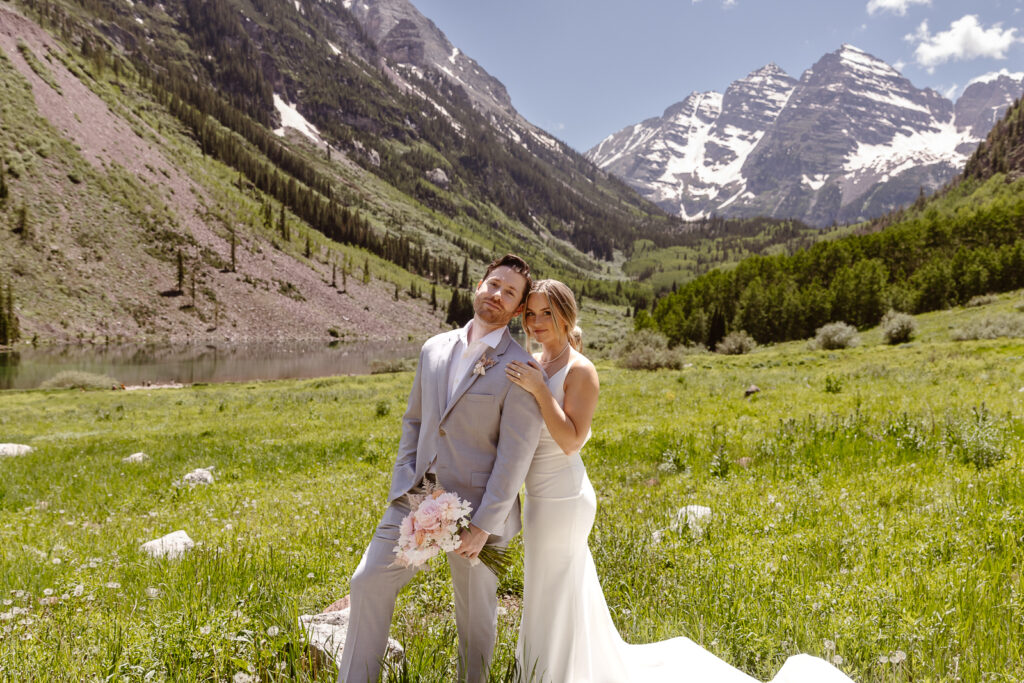 A bride and groom at their elopement at Maroon Bells in Aspen, Colorado