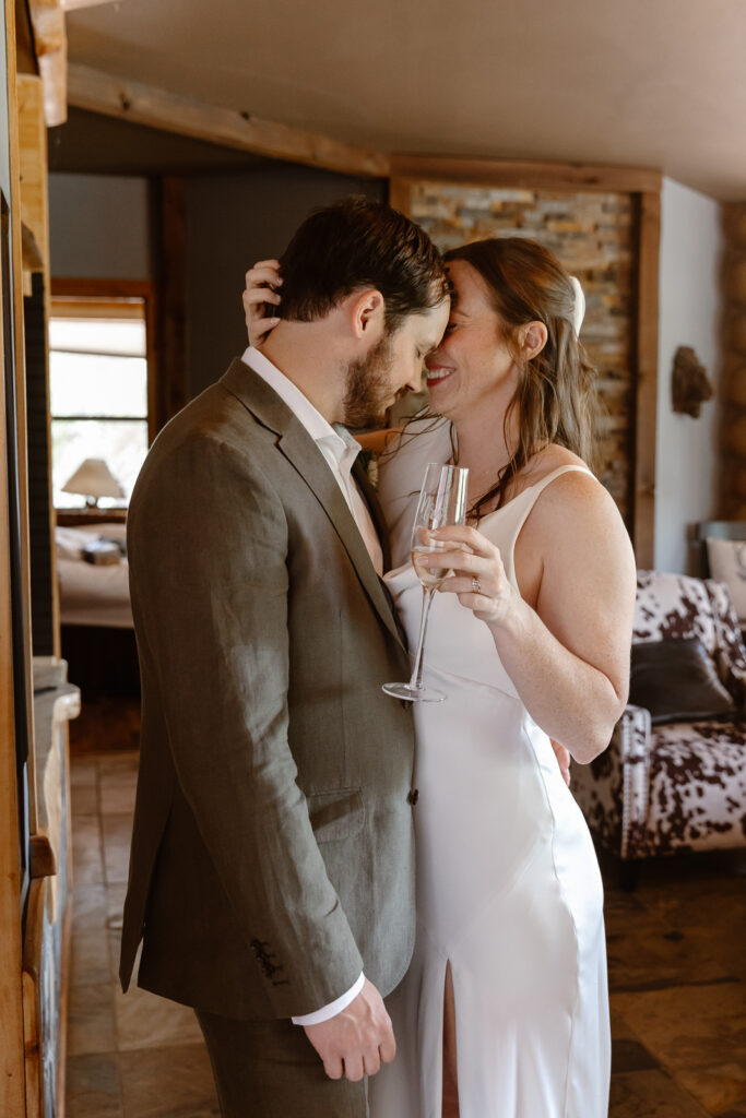 A couple enjoying a quiet moment together during their elopement reception. 