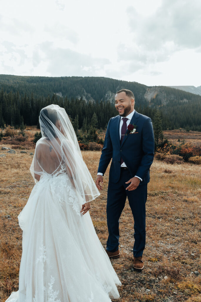 A couple doing a first look before they exchange vows at their Brainard Lake, Colorado elopement